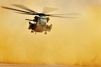 A U.S. Marine Corps CH-53E Super Stallion helicopter prepares to land at Camp Al-Galail, Qatar, April 21, 2013, to drop off Marines assigned to Lima Company, 3rd Battalion, 2nd Marine Regiment, 26th Marine Expeditionary Unit for exercise Eagle Resolve 2013.