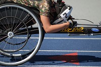 U.S. Army Spc. Elizabeth Wasil, a combat medic assigned to Bravo Company, Fort Sam Houston Warrior Transition Battalion, puts her head down after winning the women?s 1,500-meter handcycling event during the 2013 Warrior Games in Colorado Springs, Colo., May 13, 2013.