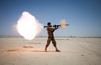 An Afghan National Army soldier assigned to Mobile Strike Force Kandak fires an RPG-7 rocket-propelled grenade launcher May 20, 2013, during a live-fire exercise at Camp Shorabak in Helmand province, Afghanistan.