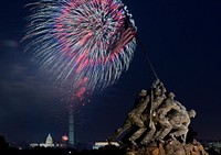Independence Day celebration fireworks are seen from the Iwo Jima, U.S. Marine Corps Memorial in Arlington, VA on Jul. 4, 2013.