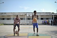 Two boys practice their shooting on a basketball court in Mogadishu, Somalia, on June 6. Banned under the extremist group, Al Shabaab, Basketball is once again making a resurgence in Mogadishu.