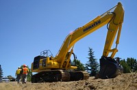 Corps reps inspect the levee construction site near River Park