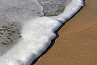 Sea shore. A coastline or seashore is the area where land meets the sea or ocean. Original public domain image from Flickr