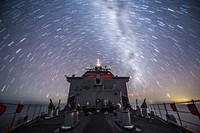 The amphibious dock landing ship USS Germantown (LSD 42) transits the Coral Sea Aug. 10, 2013.