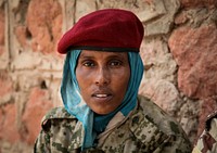 A female Somali soldier is seen in the town of Belet Weyne, 19 August 2013. AU-UN IST PHOTO / ILYAS A. ABUKAR. Original public domain image from Flickr