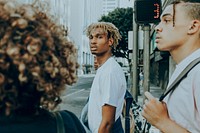 People waiting to cross the road, vivid tone