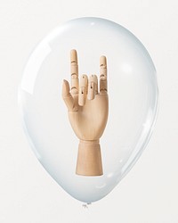 Wooden hand mannequin in clear balloon