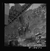 Production. Copper. Loading copper ore from an open-cut mine of the Phelps-Dodge Mining Company at Morenci, Arizona. This plant is supplying great quantities of the copper so vital in our war effort. Sourced from the Library of Congress.