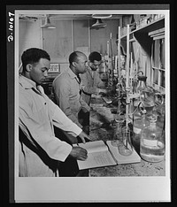 African Americans speed war work for Tennessee Valley Authority. (left to right) Paul L. Imes, Samuel C. Watkins, and George W. Richardson are employed as laboratory technicians by TVA at its plant at Muscle Shoals. They are doing high-grade sub-professional work and are in training for professional positions. Sourced from the Library of Congress.