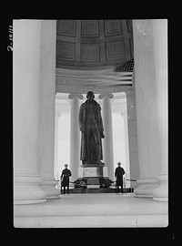 Jefferson Memorial. Within the Jefferson Memorial rotunda in Washington, D.C., stands this nineteen-foot statue of America's third president. A Marine Honor Guard stands watch at its base where the original Declaration of Independence has been placed to commemorate Jefferson's bi-centennial anniversary, April 12, 1943. The The plaster of paris statue, made by a sculptor Rudolph Evans, will be cast in bronze after the war. Sourced from the Library of Congress.