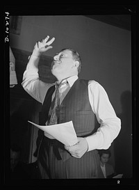 "You Can't Do Business With Hitler." You might guess from his gestures that Abrasha Robofsky is rehearsing for his portrayal of Adolf Hiter in "You Can't Do Business With Hitler," radio show written and produced by the radio section of the Office of War Information (OWI). Sourced from the Library of Congress.