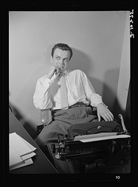 "You Can't Do Business With Hitler." Elwood Hoffman writes the script for "You Can't Do Business With Hitler," transcribed radio show whose distribution among radio stations in the United States has jumped from 300 when it was inaugurated in January, t1942. The programs are written by the radio section of the Office of War Information (OWI). Sourced from the Library of Congress.