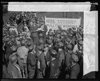 War production drive. Anthracite rallies. A lucky miner who received a 100 dollar war bond at one of the four anthracite miners' rallies in Eastern Pennsylvania on September 28th through October 1st. Only miners with one-hundred-percent work attendance could participate in the drawing. Sourced from the Library of Congress.