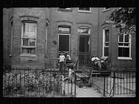 A once proud section, Washington, D.C. These houses now are overcrowded with African American population and greatly in need of more sanitary methods. Sourced from the Library of Congress.
