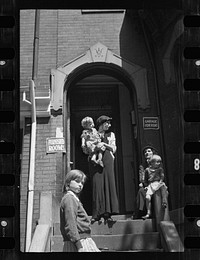 [Untitled photo, possibly related to: Front of a typical house offering furnished rooms for rent, District of Columbia]. Sourced from the Library of Congress.