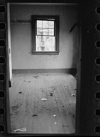 [Untitled photo, possibly related to: Slum front yard playground, Washington, D.C. Such is the front yard available to these two youngsters to play in]. Sourced from the Library of Congress.