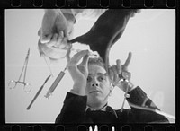 Inoculation of guinea pig. Experimental farm of Department of Agriculture, Prince George's County, Maryland. Sourced from the Library of Congress.