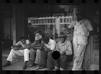 [Untitled photo, possibly related to: Typical view of store and cotton trader in small Arkansas town. This one made in Marianna, Arkansas]. Sourced from the Library of Congress.