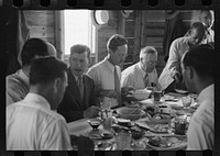 Resettlement officials eating in the mess hall at Greenbelt, Maryland. Sourced from the Library of Congress.