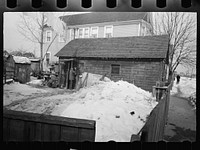 [Untitled photo, possibly related to: Garage home and inhabitant, Manville, New Jersey]. Sourced from the Library of Congress.