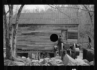 [Untitled photo, possibly related to: Demonstrating unique homemade cider press invented by man living on Crabtree Recreational Demonstration Area, Raleigh, North Carolina]. Sourced from the Library of Congress.