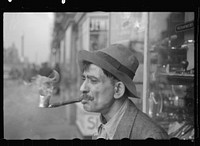 Man with homemade pipe, Washington, D.C.. Sourced from the Library of Congress.