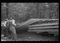 Unloading wall of prefabricated house from truck, Roanoke Farms Project, North Carolina. Sourced from the Library of Congress.
