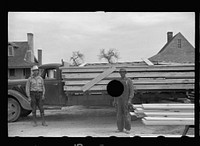 [Untitled photo, possibly related to: Truck loaded with parts of prefabricated house, Roanoke Farms, North Carolina]. Sourced from the Library of Congress.