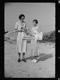 [Untitled photo, possibly related to: Homesteaders carrying shawls, etc., woven at Tygart Valley Homesteads, West Virginia]. Sourced from the Library of Congress.