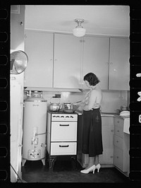 [Untitled photo, possibly related to: Hightstown homesteader in the kitchen of her new home, New Jersey]. Sourced from the Library of Congress.