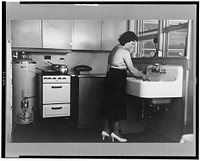 Hightstown homesteader in the kitchen of her new home, New Jersey. Sourced from the Library of Congress.