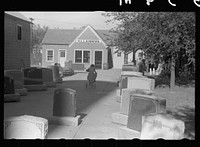 Girl playing among tombstones, Lexington, Nebraska. Sourced from the Library of Congress.