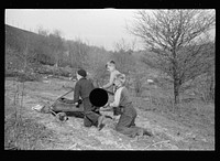 [Untitled photo, possibly related to: Miner's sons bringing home coal which they have salvaged from slag pile.  Kempton, West Virginia]. Sourced from the Library of Congress.