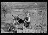 [Untitled photo, possibly related to: Miner's sons bringing home coal which they have salvaged from slag pile.  Kempton, West Virginia]. Sourced from the Library of Congress.