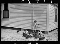 [Untitled photo, possibly related to: Mrs. Cole in her garden, Irwinville Farms, Georgia]. Sourced from the Library of Congress.