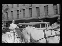 [Untitled photo, possibly related to: Roman chariot at the tail end of the sesquicentennial, Cincinnati, Ohio]. Sourced from the Library of Congress.