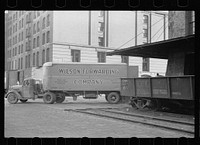 [Untitled photo, possibly related to: Family of trucker waiting while truck is being loaded, Minneapolis, Minnesota]. Sourced from the Library of Congress.