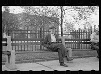 Man on park bench, Gateway District, Minneapolis, Minnesota. Sourced from the Library of Congress.