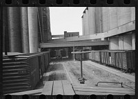 [Untitled photo, possibly related to: Freight car and flour mill, Minneapolis, Minnesota]. Sourced from the Library of Congress.