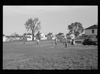 [Untitled photo, possibly related to: Pitching horseshoes, Greendale, Wisconsin]. Sourced from the Library of Congress.