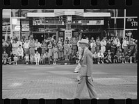 [Untitled photo, possibly related to: Watching parade, Letter Carriers Convention, Milwaukee, Wisconsin]. Sourced from the Library of Congress.