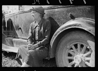 [Untitled photo, possibly related to: Farm woman waiting for her husband. Auction near Tenstrike, Minnesota]. Sourced from the Library of Congress.