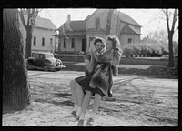 [Untitled photo, possibly related to: Girl swinging, Woodbine, Iowa]. Sourced from the Library of Congress.