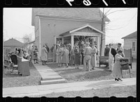 Auction of household goods, Grundy Center, Iowa. Sourced from the Library of Congress.