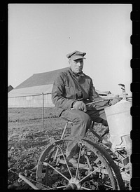 [Untitled photo, possibly related to: Farm manager talking with farmer at Granger Homesteads, Iowa]. Sourced from the Library of Congress.