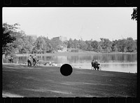 [Untitled photo, possibly related to: Small family feeding ducks in park on Saturday afternoon, Minneapolis, Minnesota]. Sourced from the Library of Congress.