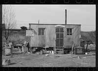 [Untitled photo, possibly related to: Shack on the edge of the city dump, Dubuque, Iowa]. Sourced from the Library of Congress.