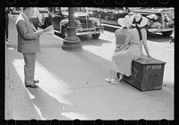 [Untitled photo, possibly related to: Girls waiting for street car, Chicago, Illinois]. Sourced from the Library of Congress.