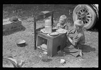 [Untitled photo, possibly related to: Migrant children eating, Berrien County, Michigan]. Sourced from the Library of Congress.