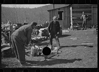 [Untitled photo, possibly related to: Chopping wood for the schoolteacher, Shenandoah National Park, Virginia]. Sourced from the Library of Congress.